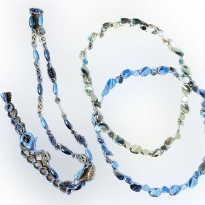 Multi-color ankle bracelet and gold and silver stretch bracelet set.